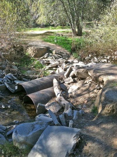Detroyed bridge in Limekiln Canyon prevents LAFD access to victims